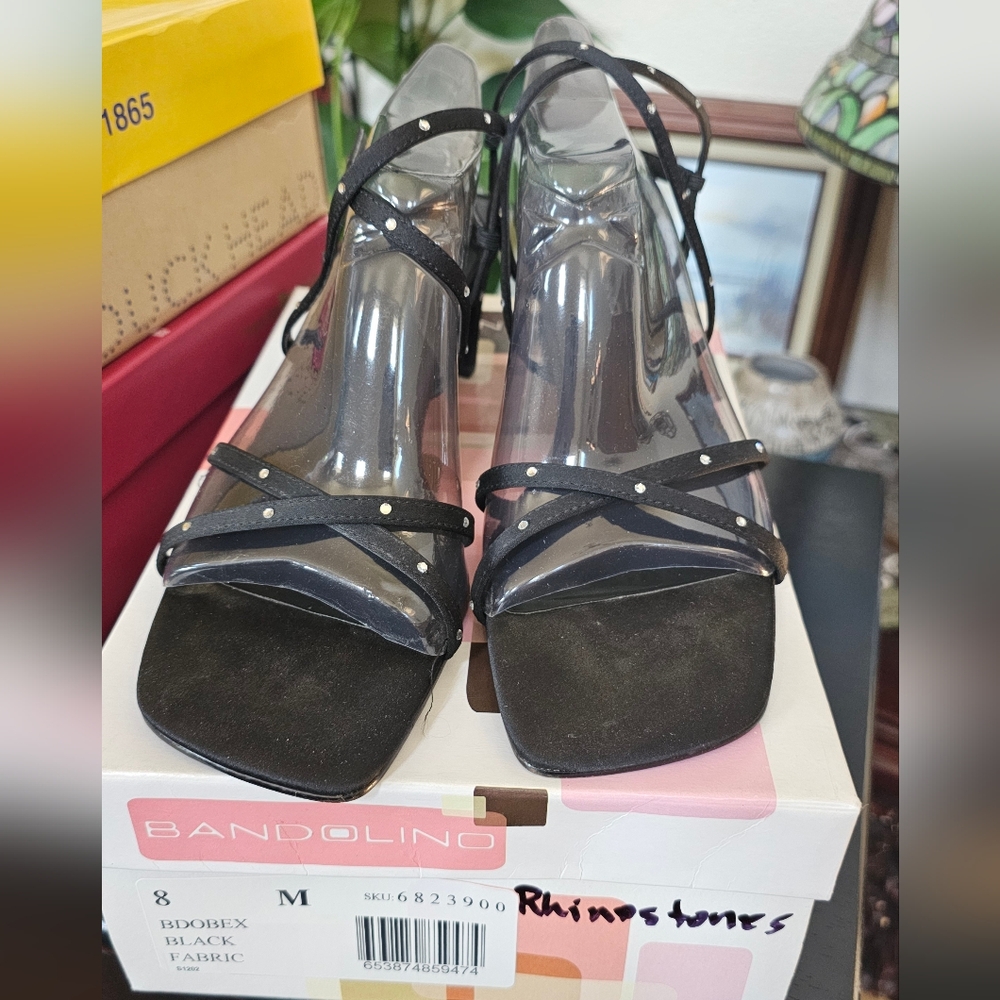 Bandolino heels size 8. They have rhinestones.  Worn a couple of times. If you a